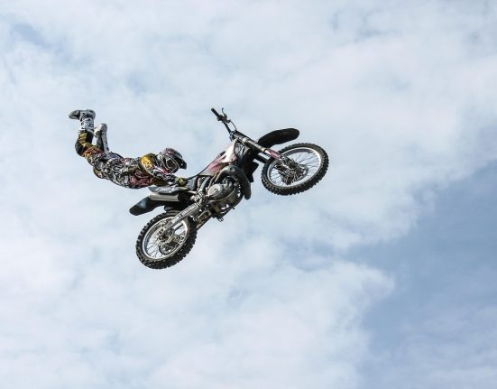 Mountain Biker Jumps Between Two Autonomous Scania Trucks